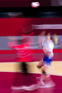 Players compete in the women's handball match between