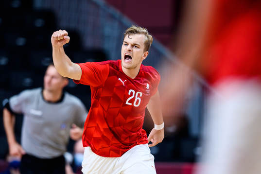 Johan Hansen of Denmark celebrates in the men’s handball