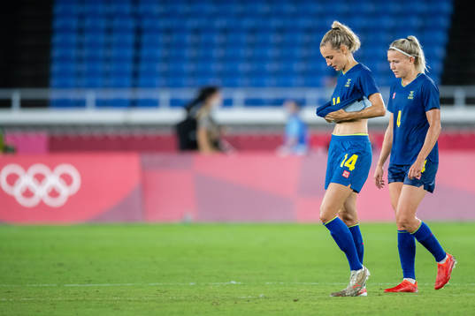 Nathalie Björn and Hanna Glas of Sweden looks dejected in