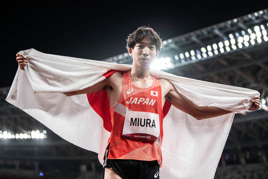 Ryuji Miura of Japan celebrates