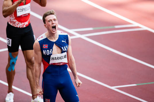 Karsten Warholm of Norway celebrates