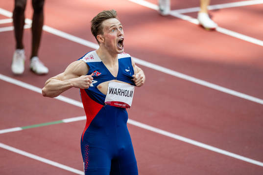 Karsten Warholm of Norway celebrates