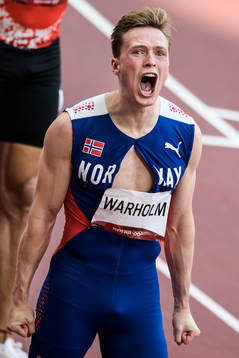 Karsten Warholm of Norway celebrates
