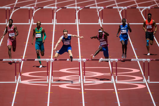 Karsten Warholm of Norway and Rai Benjamin of USA compete