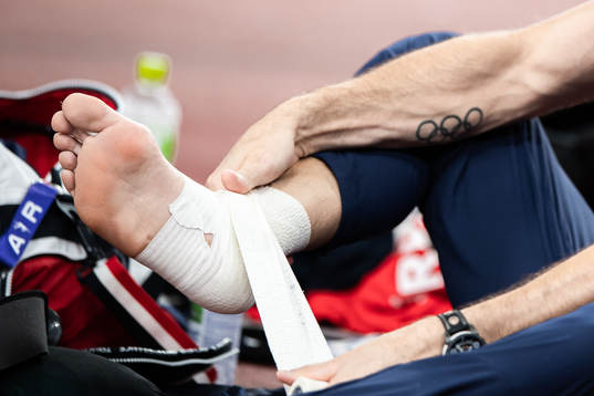 Renaud Lavillenie of France with an injured foot in men's