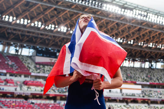 Karsten Warholm of Norway celebrates