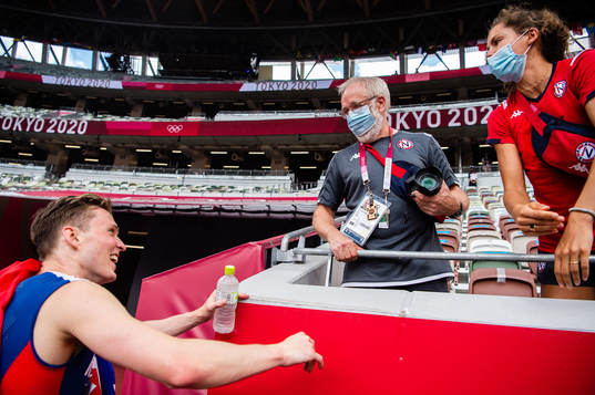 Karsten Warholm of Norway celebrates with coach Leif Olav