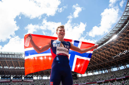 Karsten Warholm of Norway celebrates