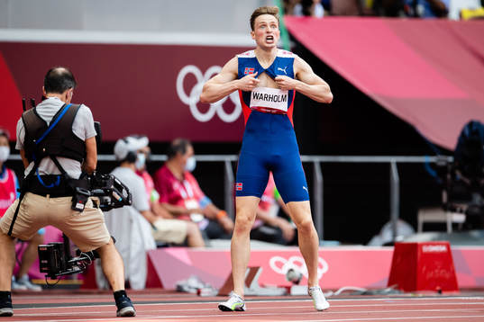 Karsten Warholm of Norway celebrates