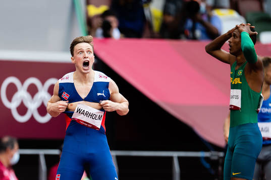 Karsten Warholm of Norway celebrates