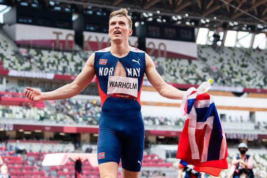 Karsten Warholm of Norway celebrates