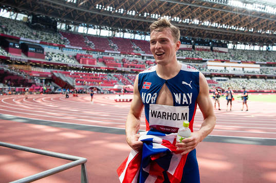 Karsten Warholm of Norway celebrates