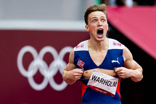 Karsten Warholm of Norway celebrates