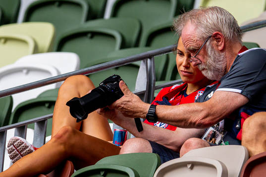 Amalie Iuel and Leif Olav Alnes, coach, in the stands