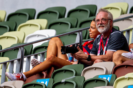 Amalie Iuel and Leif Olav Alnes, coach, in the stands