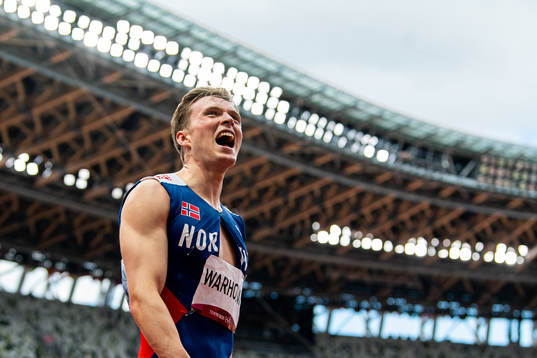 Karsten Warholm of Norway celebrates