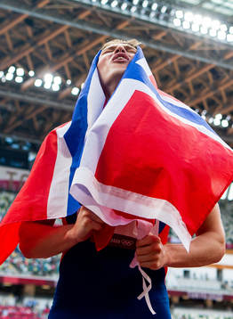 Karsten Warholm of Norway celebrates