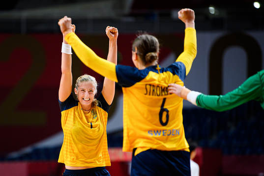 Linn Blohm and Carin Strömberg of Sweden celebrate in the