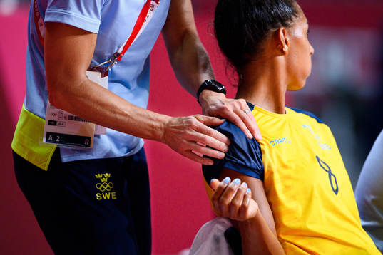 Jamina Roberts of Sweden receives medicinal treatment in