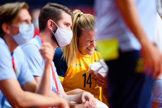 Johanna Westberg of Sweden receives medicinal treatment in