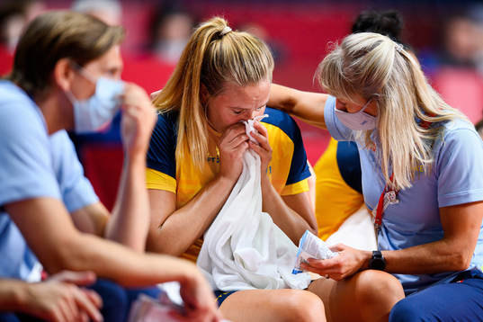 Johanna Westberg of Sweden receives medicinal treatment in
