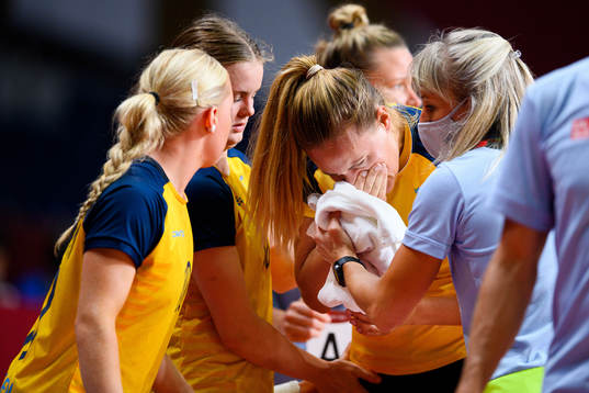 Johanna Westberg of Sweden receives medicinal treatment in