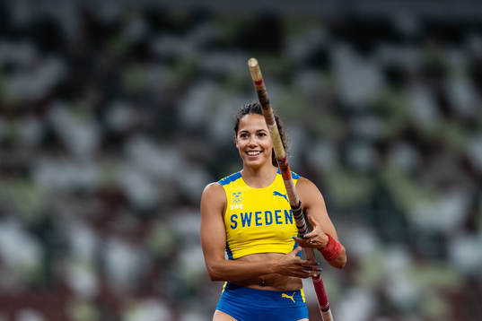 Angelica Bengtsson of Sweden celebrates while competing in
