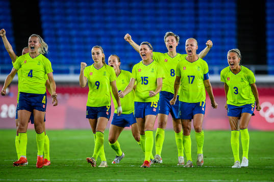 Players of Sweden celebrate