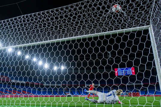 Julia Grosso of Canada scores the decisive penalty