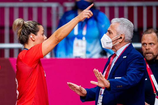 Nora Mørk of Norway in a discussion with an official in
