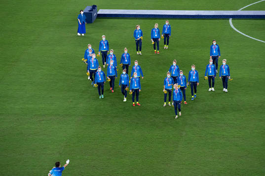 Players of Sweden tries to leave the pitch but is not