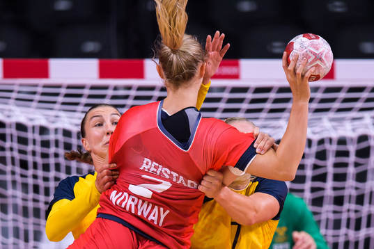 Anna Lagerquist and Linn Blohm of Sweden against Henny