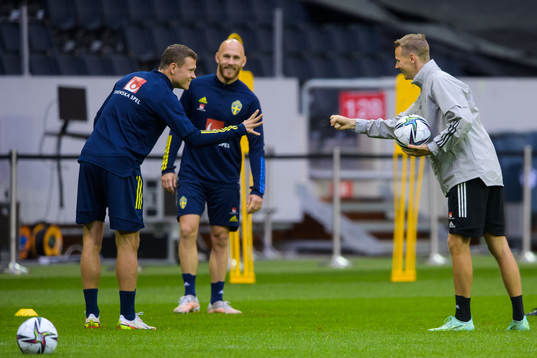 Viktor Claesson and goalkeeper coach Maths Elfvendal of the