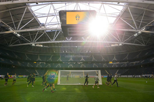 Players of the Swedish national football team warming up