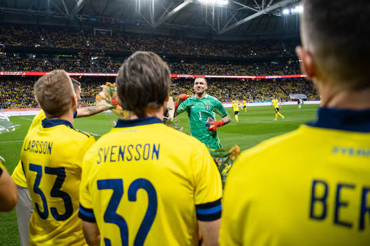 goalkeeper Robin Olsen with former players Sebastian