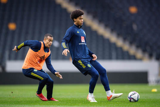Robin Quaison and Jens-Lys Cajuste of the Swedish national