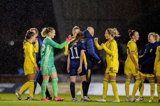 Goalkeeper Jennifer Falk and Emma Kullberg of Sweden