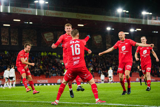 Robert Thomas Taylor of Brann celebrates with Bård Finne,