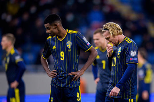 Alexander Isak and Emil Forsberg of Sweden look dejected