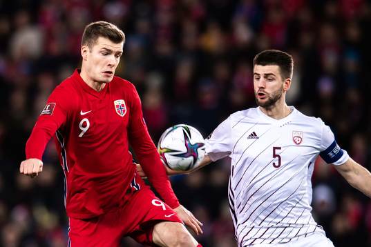 Alexander Sørloth of Norway and Antonijs Cernomordijs of