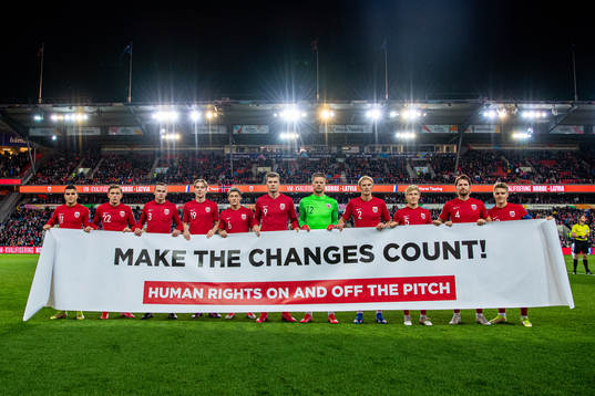 The starting eleven of Norway pose for a team photo holding