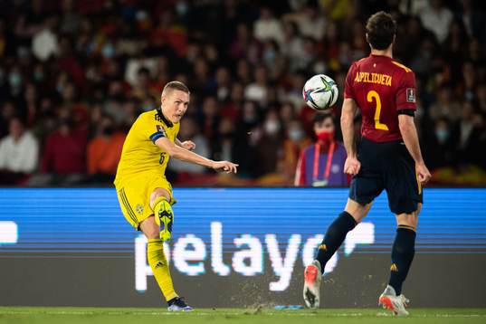 Ludwig Augustinsson of Sweden and Cesar Azpilicueta of Spain