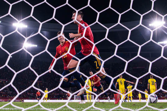 Rodrigo and Alvaro Morata of Spain celebrate the 1-0 goal