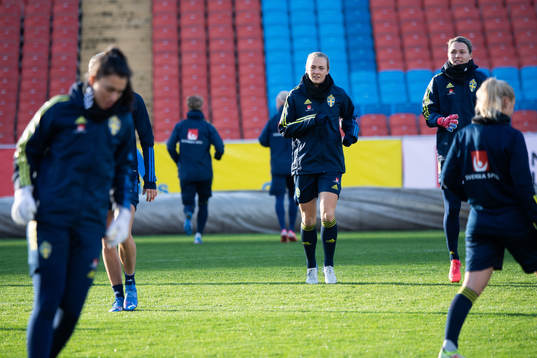 Magdalena Eriksson and goalkeeper Jennifer Falk of the