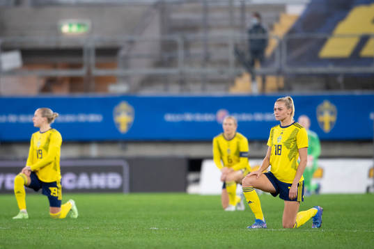 Fridolina Rolfö of Sweden takes a knee in support of the
