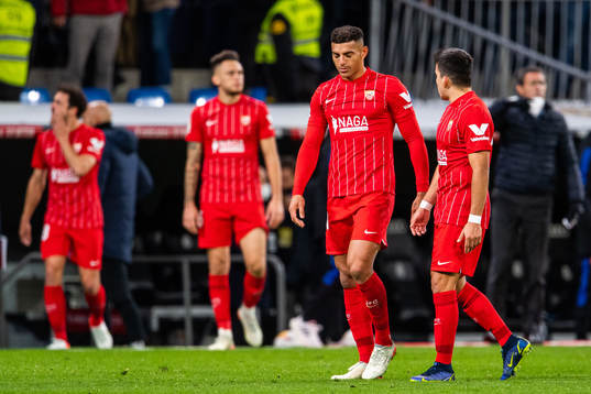 Diego Carlos of Sevilla looks dejected