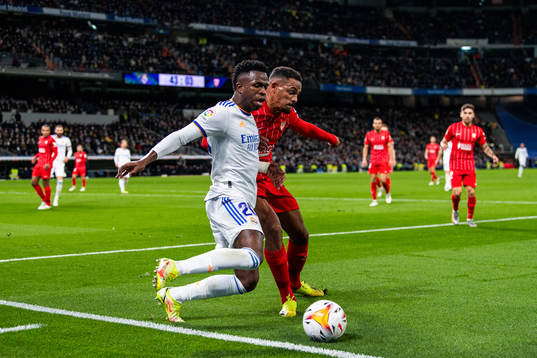Fernando of Sevilla and Vinicius Junior of Real Madrid