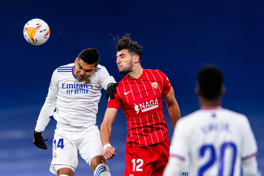 Casemiro of Real Madrid and Rafa Mir of Sevilla
