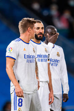 Toni Kroos, Karim Benzema and Ferland Mendy of Real Madrid