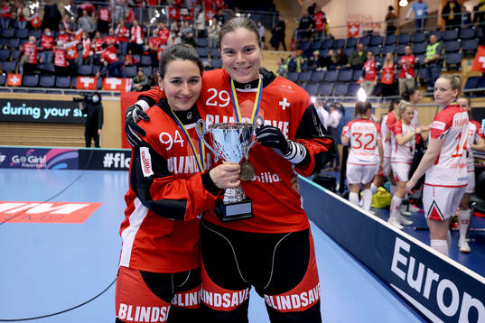 Swiss Lara Heini and Monika Schmid celebrate the bronze